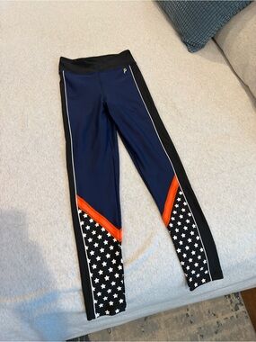 P.E Nation Women’s Navy & Black Star Print Leggings with Orange Accent